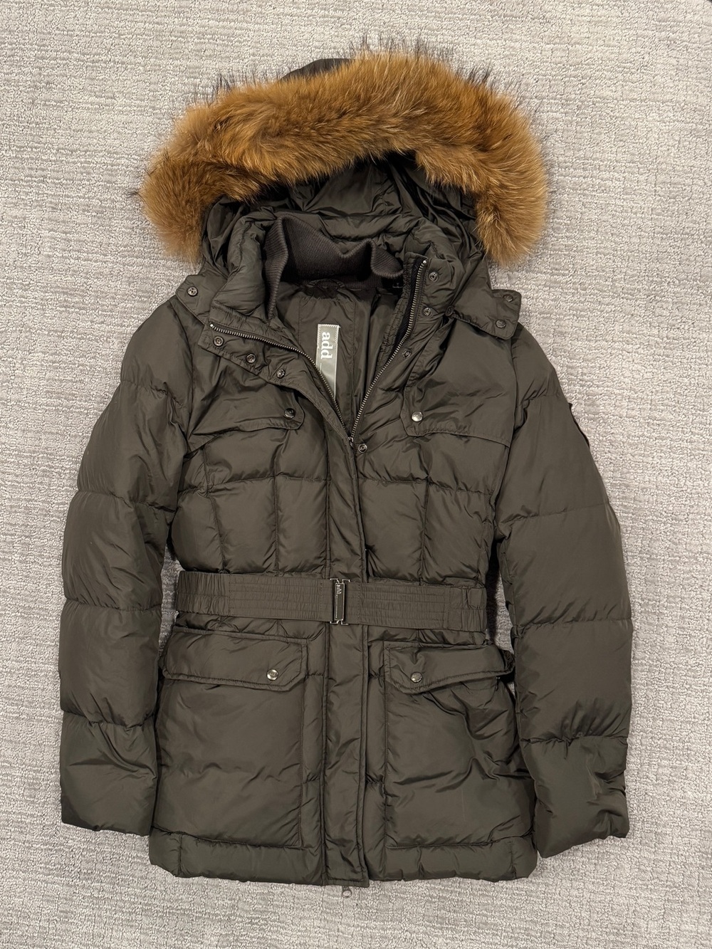 Add puffer jacket with fur trim hood and belted waist